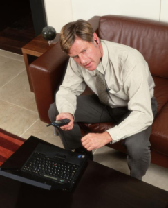 businessman on phone and laptop